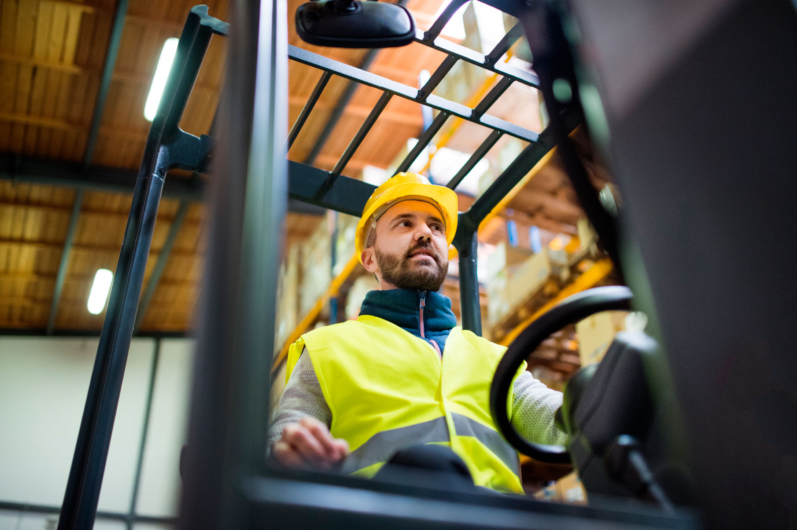 Man driving a fork lift truck