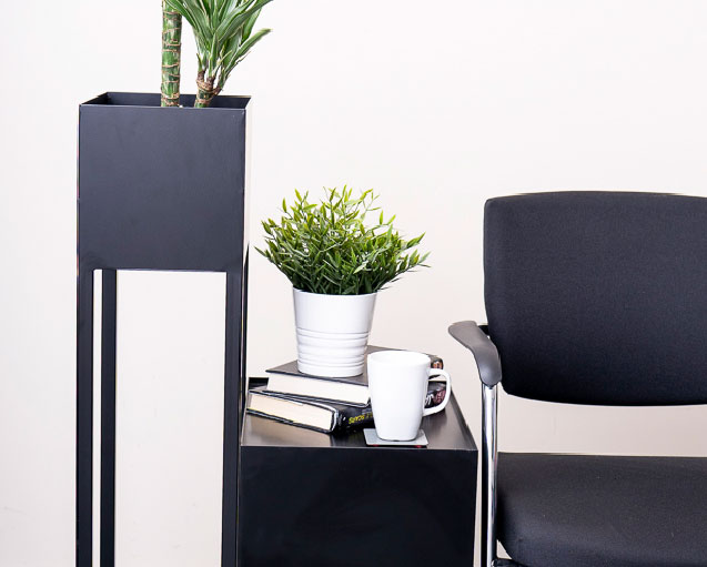 Office chair, a table and a plant