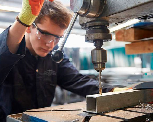 Man with drilling tool